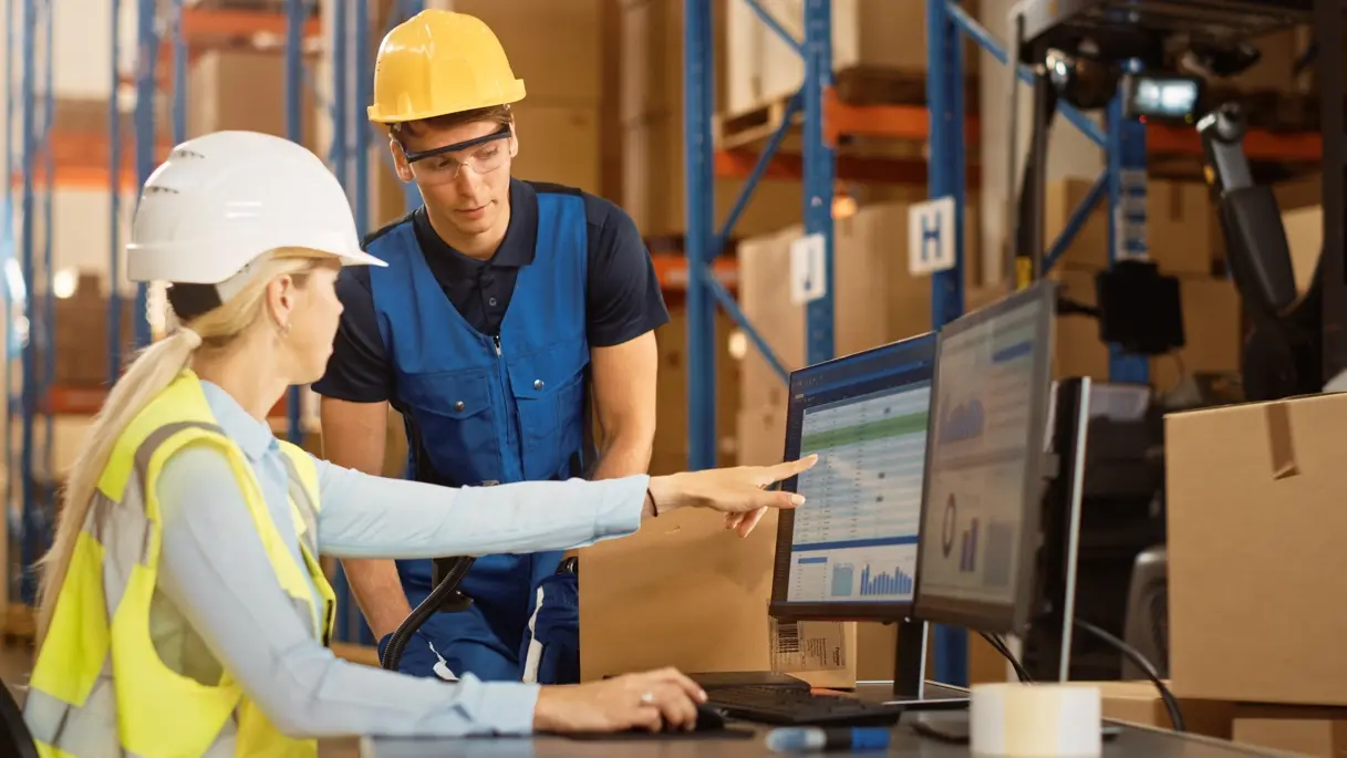 1 RFID Warehouse Mgmt Retail Warehouse Manager Uses Computer with Inventory Checking Software Adobe 389648221